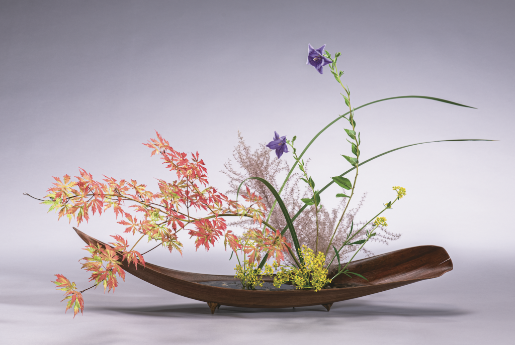 japanese flower arrangement with autumn materials